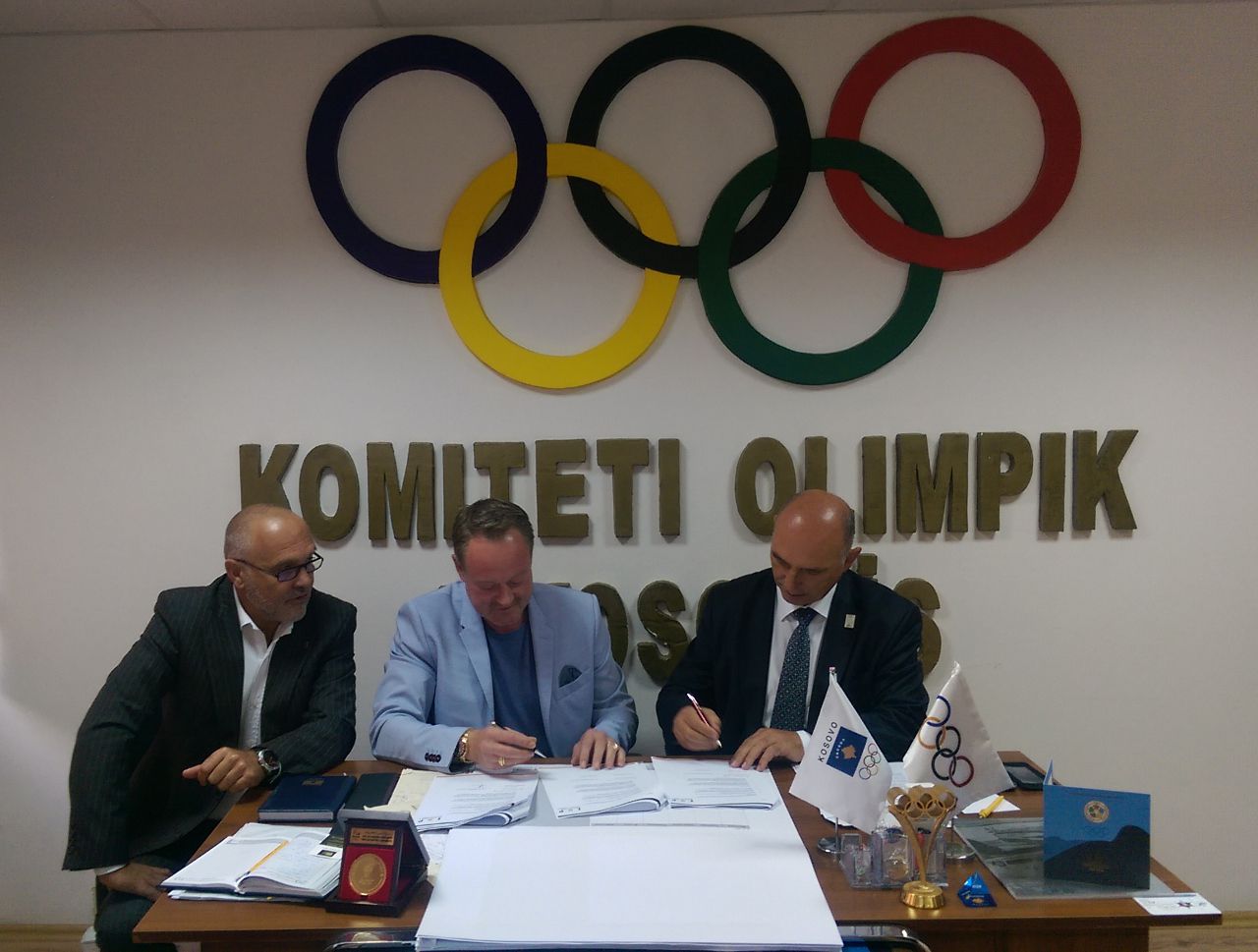 Signing documents at NOC Kosovo