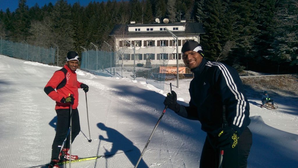 two skiers on a slope
