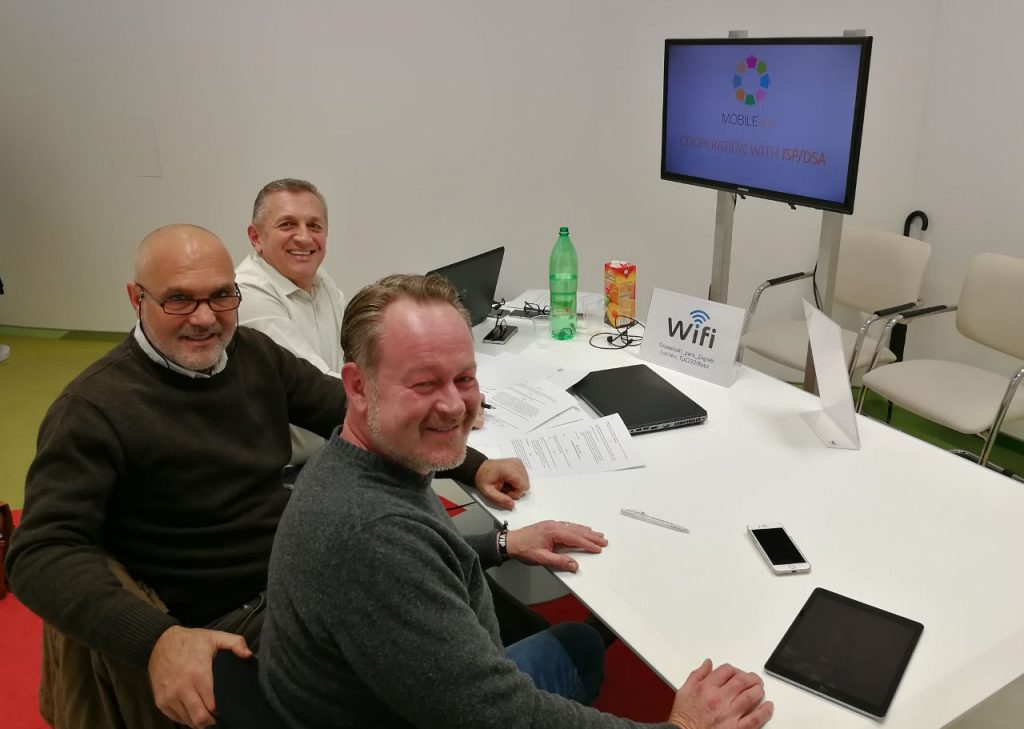 men in a conference room