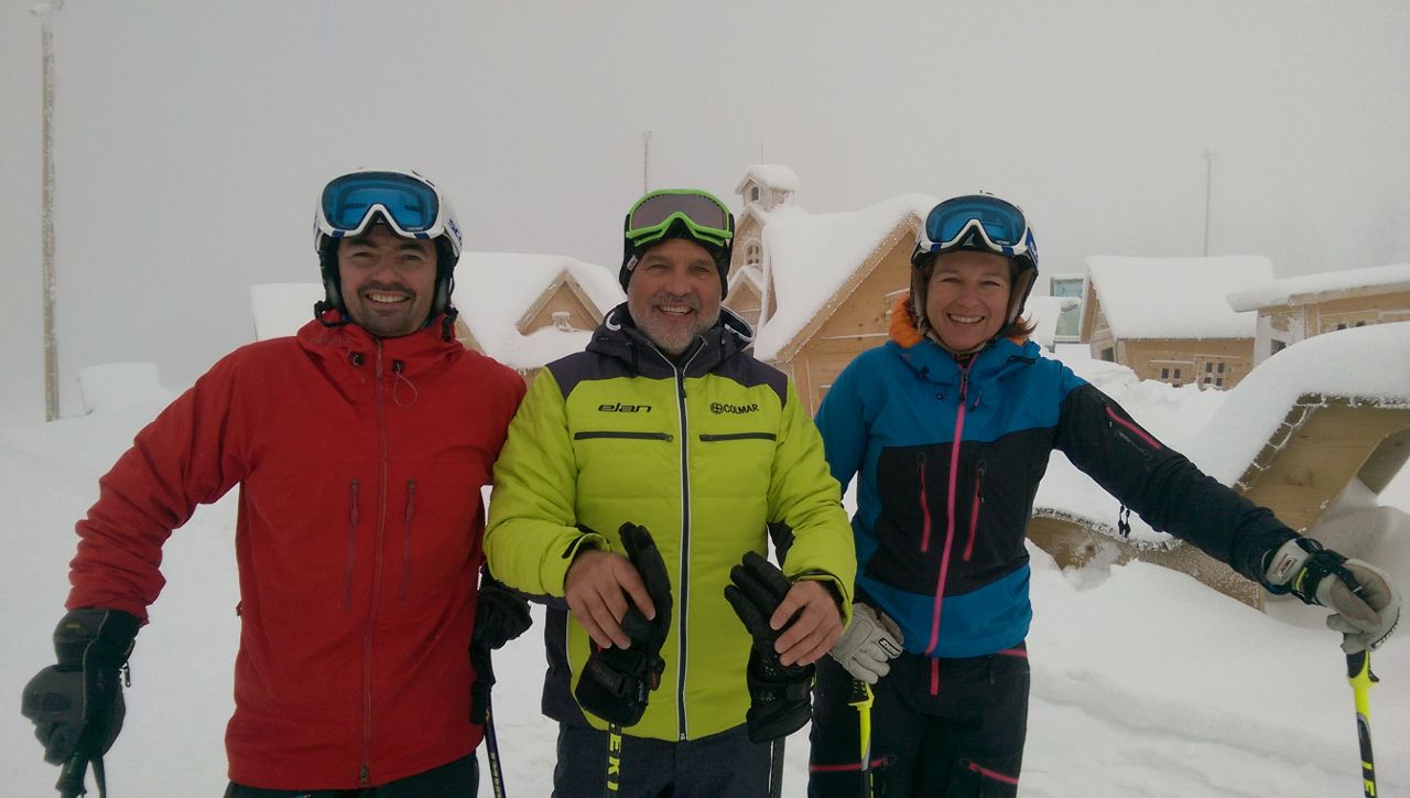 skiers posing for a picture