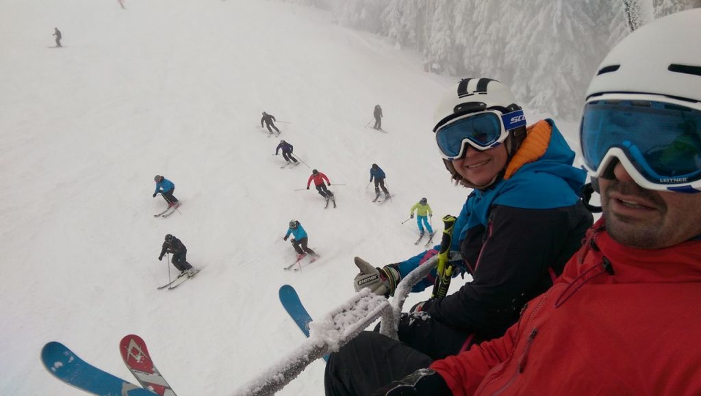 skiers on a chair lift