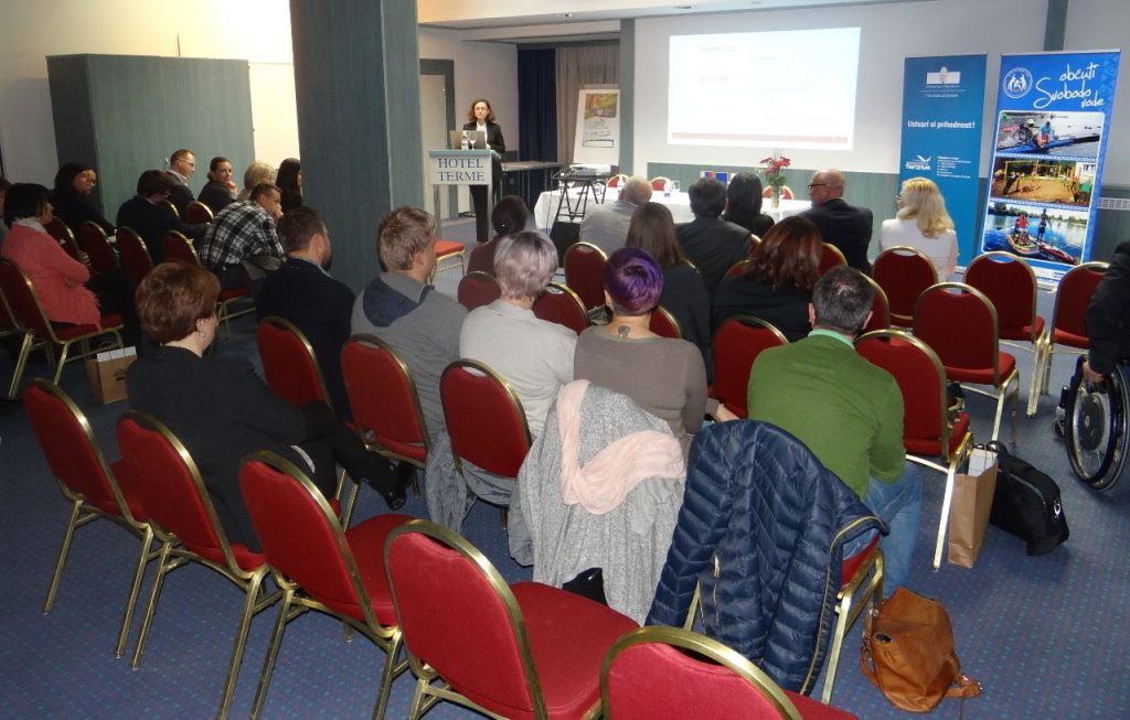 woman lecturing at a conference