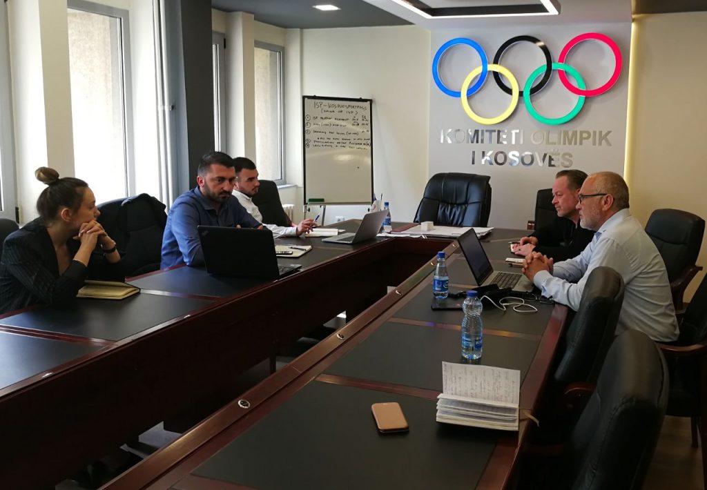 men in a conference room