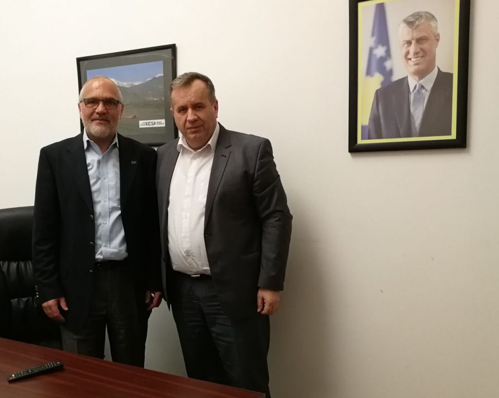 two men posing for a picture